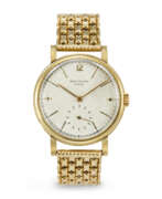Patek Philippe. PATEK PHILIPPE, EXTREMELY RARE AND LARGE YELLOW GOLD 'CALTRAVA EMPIRE', REF. 2511