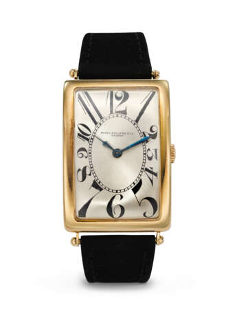 PATEK PHILIPPE, YELLOW GOLD RECTANGULAR WRISTWATCH, WITH "EXPLODING" NUMERALS - photo 1