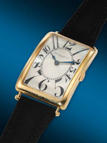 PATEK PHILIPPE, YELLOW GOLD RECTANGULAR WRISTWATCH, WITH "EXPLODING" NUMERALS - photo 2