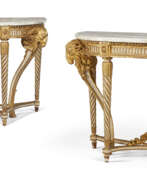 Tables. A PAIR OF LATE LOUIS XV WHITE PAINTED AND PARCEL-GILT CONSOLE TABLES