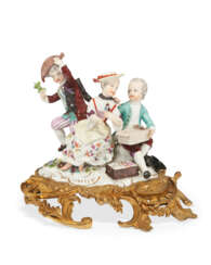 AN ORMOLU-MOUNTED MEISSEN PORCELAIN FIGURAL GROUP OF 'THE LOTTERY'