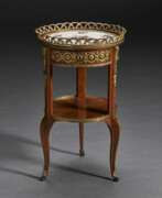 Столы. A LATE LOUIS XV ORMOLU AND SEVRES PORCELAIN-MOUNTED TULIPWOOD GUERIDON