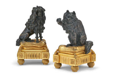 A PAIR OF LOUIS XVI STYLE ORMOLU AND PATINATED BRONZE CHENETS