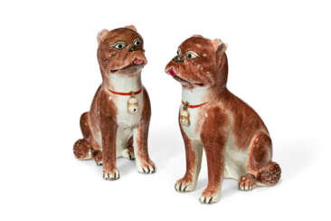 A PAIR OF CHINESE EXPORT PORCELAIN FAMILLE ROSE MODELS OF PUGS