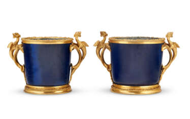 A NEAR PAIR OF REGENCE ORMOLU-MOUNTED CHINESE POWDER-BLUE PORCELAIN CACHE POTS