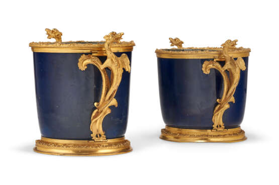 A NEAR PAIR OF REGENCE ORMOLU-MOUNTED CHINESE POWDER-BLUE PORCELAIN CACHE POTS - photo 3