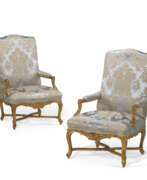 Seat furniture. A PAIR OF REGENCE GILTWOOD FAUTEUILS