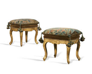 A PAIR OF LOUIS XV GILTWOOD TABOURETS