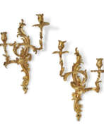 Appliques murales. A PAIR OF LOUIS XV ORMOLU TWO-BRANCH WALL LIGHTS