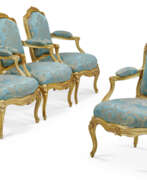 Seat furniture. A SET OF FOUR LOUIS XV GILTWOOD FAUTEUILS