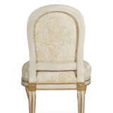 A NEAR PAIR OF LOUIS XVI WHITE-PAINTED AND PARCEL-GILT CHAISES - photo 5