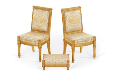 A PAIR OF EMPIRE GILTWOOD CHAISES