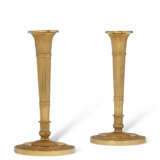 A PAIR OF EMPIRE ORMOLU CANDLESTICKS - фото 1