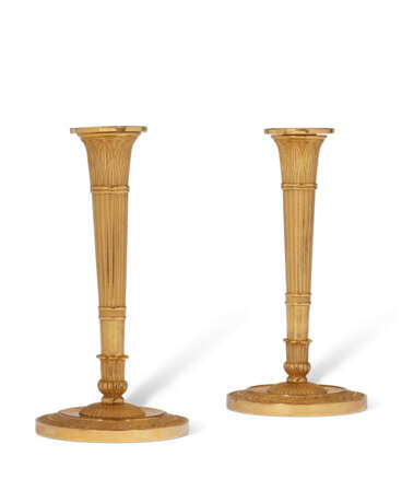 A PAIR OF EMPIRE ORMOLU CANDLESTICKS - photo 1