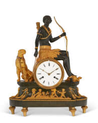 A DIRECTOIRE ORMOLU AND PATINATED BRONZE CLOCK ‘L’AFRIQUE’