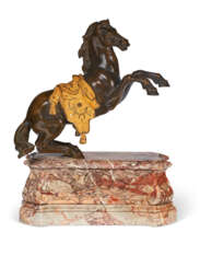 A FRENCH ORMOLU AND PATINATED BRONZE FIGURE OF A REARING HORSE