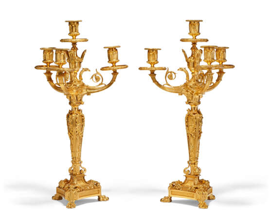 A PAIR OF FRENCH ORMOLU FOUR-BRANCH CANDELABRA - photo 1