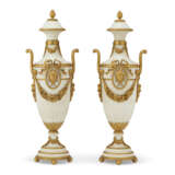 A PAIR OF FRENCH ORMOLU-MOUNTED WHITE MARBLE TWIN-HANDLED URNS - photo 1