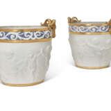 A PAIR OF SEVRES STYLE BISCUIT PORCELAIN JARDINIERES - photo 1