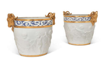 A PAIR OF SEVRES STYLE BISCUIT PORCELAIN JARDINIERES
