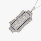 A historical pendant necklace decorated with diamonds and sapphires - фото 1