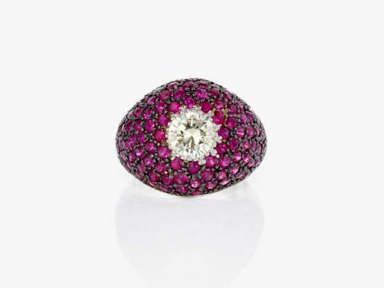 A cocktail ring decorated with rubies and a brilliant-cut diamond - фото 3