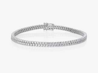 A two-strand bracelet with brilliant-cut diamonds