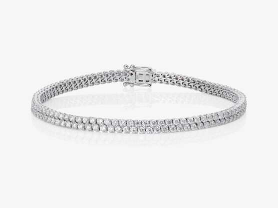 A two-strand bracelet with brilliant-cut diamonds - photo 1