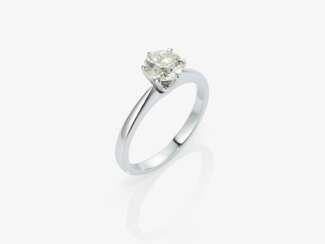 A solitaire brilliant-cut diamond ring