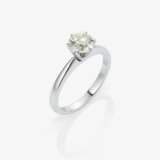 A solitaire brilliant-cut diamond ring - photo 1