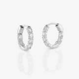 A pair of classic hoop earrings decorated with fine brilliant-cut diamonds - photo 1