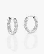 Bijoux d'oreille. A pair of classic hoop earrings decorated with fine brilliant-cut diamonds