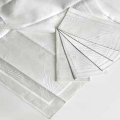 Seven tablecloths and 18 "ray decoration" napkins