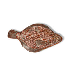 A LACQUERED NETSUKE OF A FISH