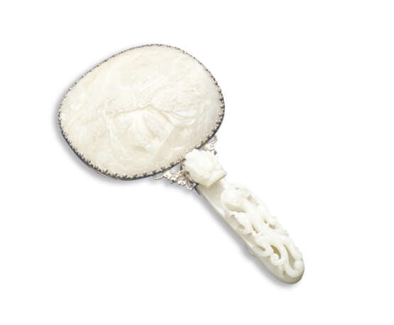 A CELADON JADE AND PALE CELADON JADE-MOUNTED HAND MIRROR - photo 1