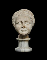 A ROMAN MARBLE HEAD OF A CHILD