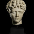A ROMAN MARBLE PORTRAIT HEAD OF A YOUTH - Jetzt bei der Auktion