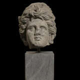 AN ETRUSCAN NENFRO FEMALE HEAD - photo 2