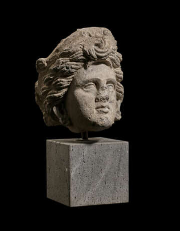 AN ETRUSCAN NENFRO FEMALE HEAD - photo 3