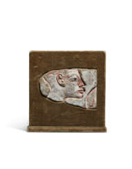 AN EGYPTIAN POLYCHROME SANDSTONE RELIEF FRAGMENT