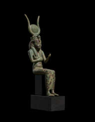 AN EGYPTIAN BRONZE SEATED ISIS
