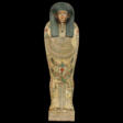 AN EGYPTIAN WOOD POLYCHROME AND GILT ANTHROPOID COFFIN FOR DJEDHOR - Prix ​​des enchères