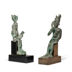 TWO EGYPTIAN BRONZE FIGURES OF HARPOCRATES AND ISIS WITH HORUS