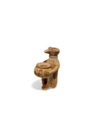 AN ITALO-CORINTHIAN POTTERY MONKEY VESSEL