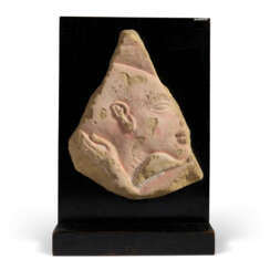 AN EGYPTIAN SANDSTONE RELIEF FRAGMENT