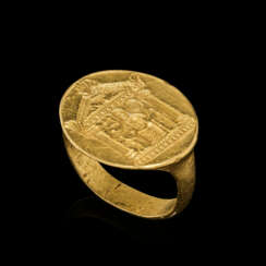 AN EGYPTIAN GOLD FINGER RING