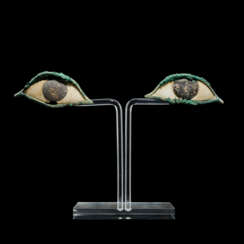 A LARGE PAIR OF EGYPTIAN BRONZE, ALABASTER AND PAINTED LIMESTONE EYES