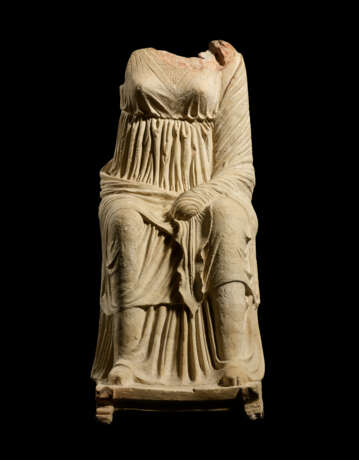 A GREEK TERRACOTTA SEATED DRAPED GODDESS - photo 1