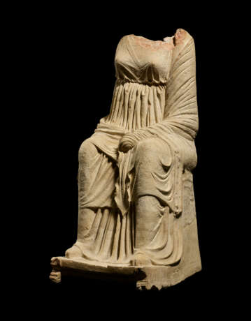 A GREEK TERRACOTTA SEATED DRAPED GODDESS - photo 2