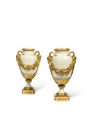 A PAIR OF LOUIS XVI ORMOLU-MOUNTED WHITE MARBLE VASES AND COVERS